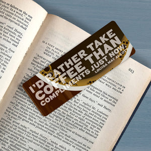 Bookmark on book with quote "I'd rather take coffee than compliments just now." Louisa May Alcott.